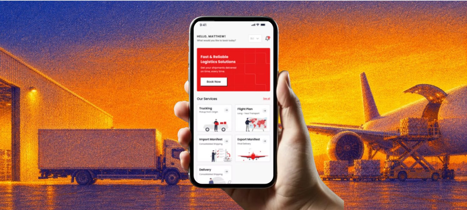 Hand holding a phone with the redesigned Kargo360 home screen against an airport cargo apron at dusk