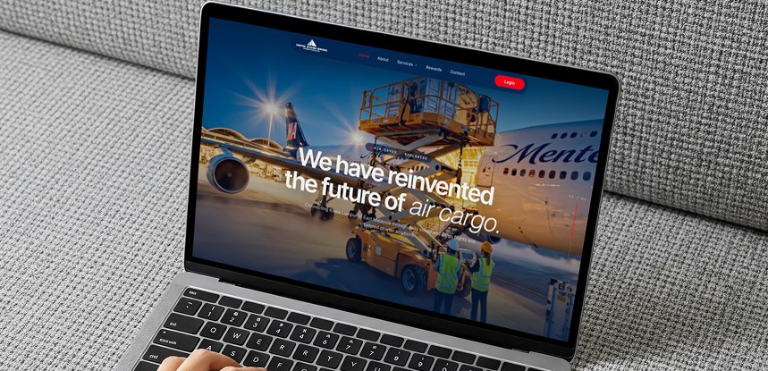 Menteiz Aviation homepage on a MacBook